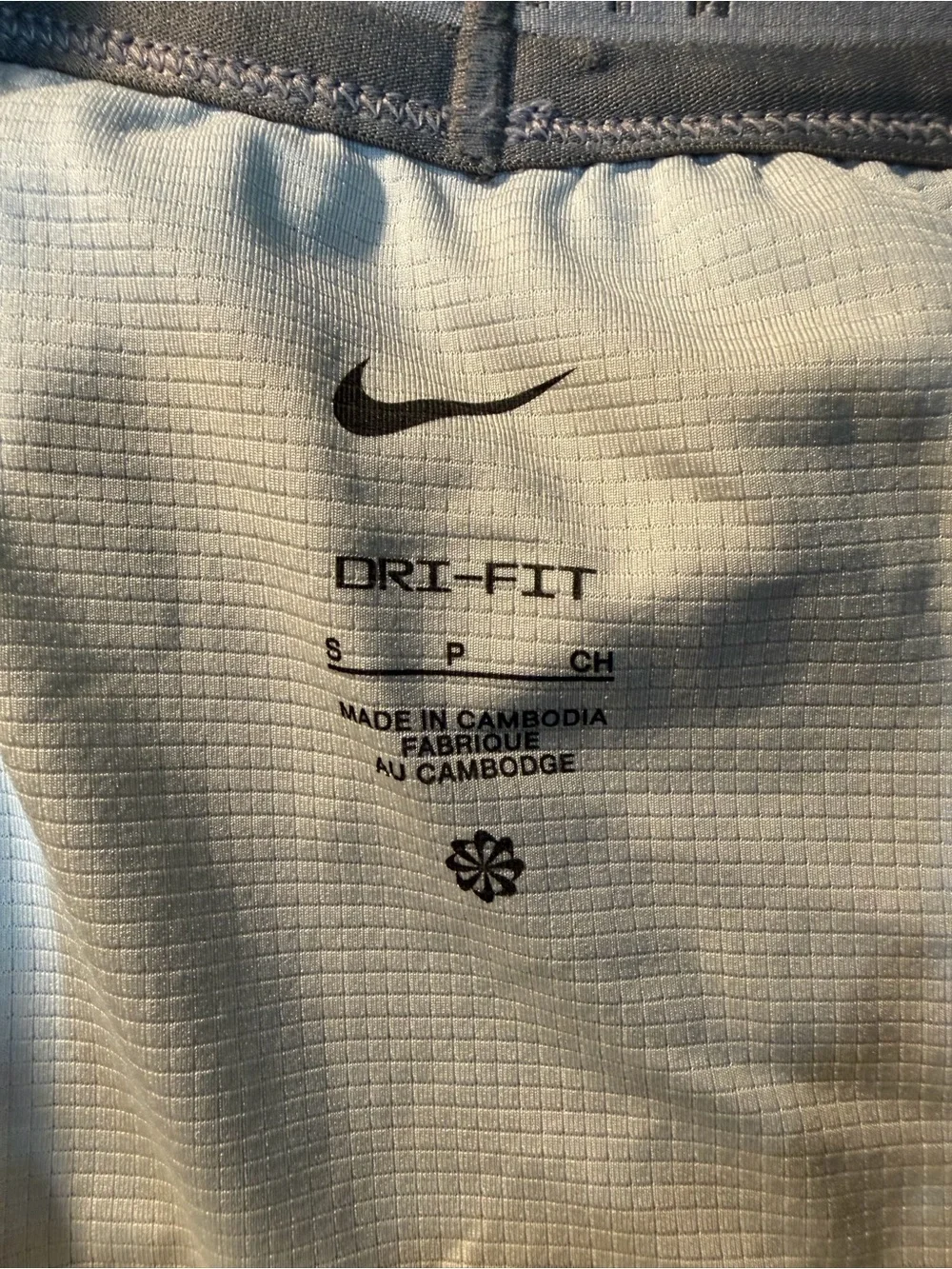 Nike Men's Light Gray Athletic Shorts with Green Drawstring